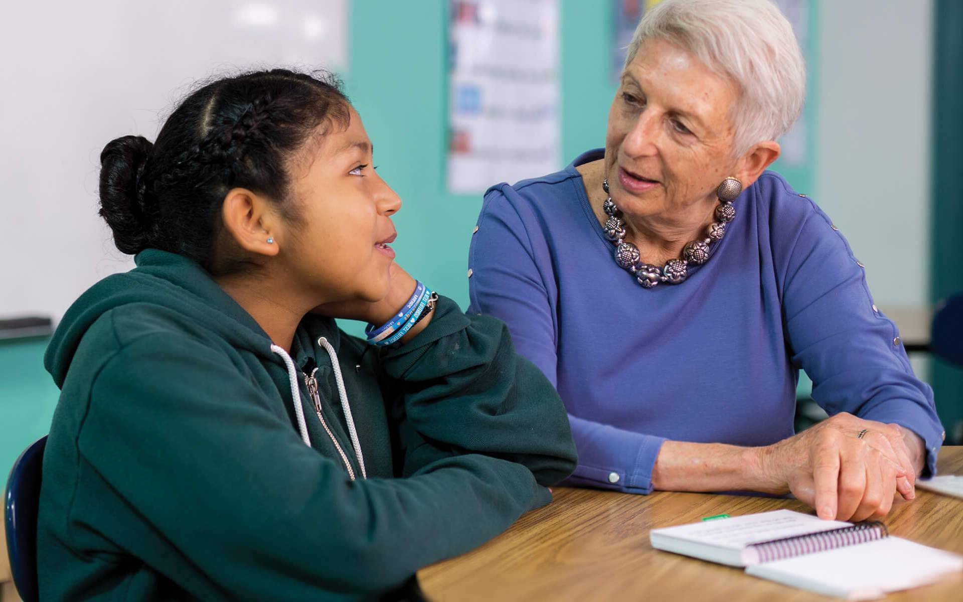 Marilyn Burns interviewing a student